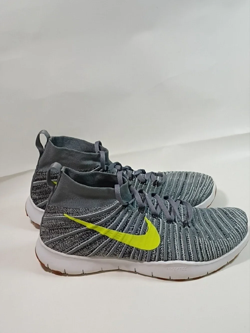 Nike Men’s Grey Flyknit Athletic Shoes with Neon Yellow Swoosh Size 10